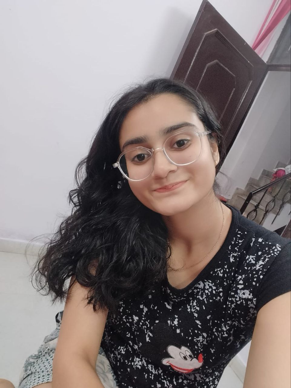 Payal smiling in a portrait
