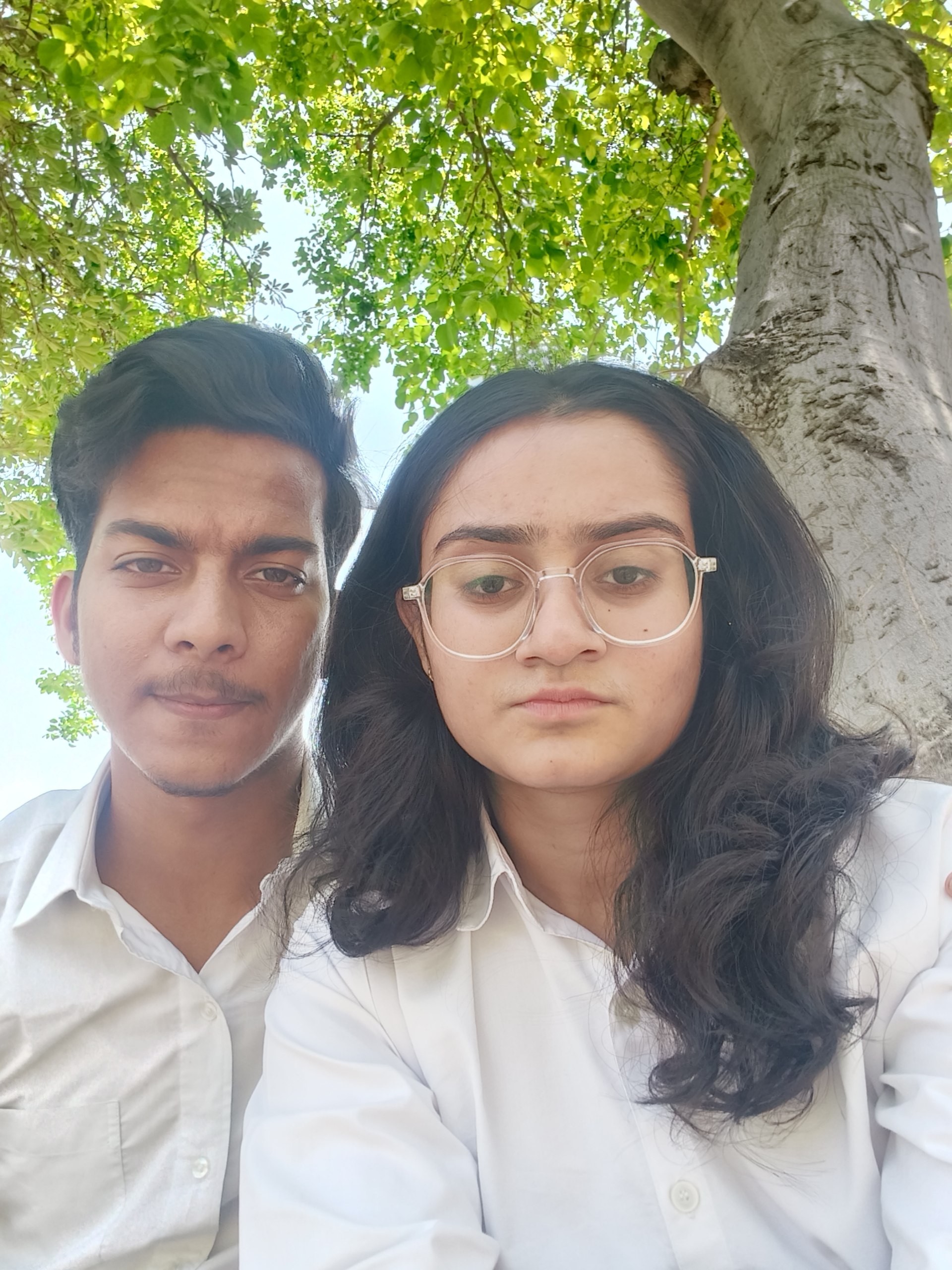 Adarsh and Payal sharing a playful moment